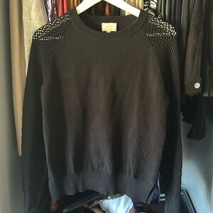Black Aritzia sweater.